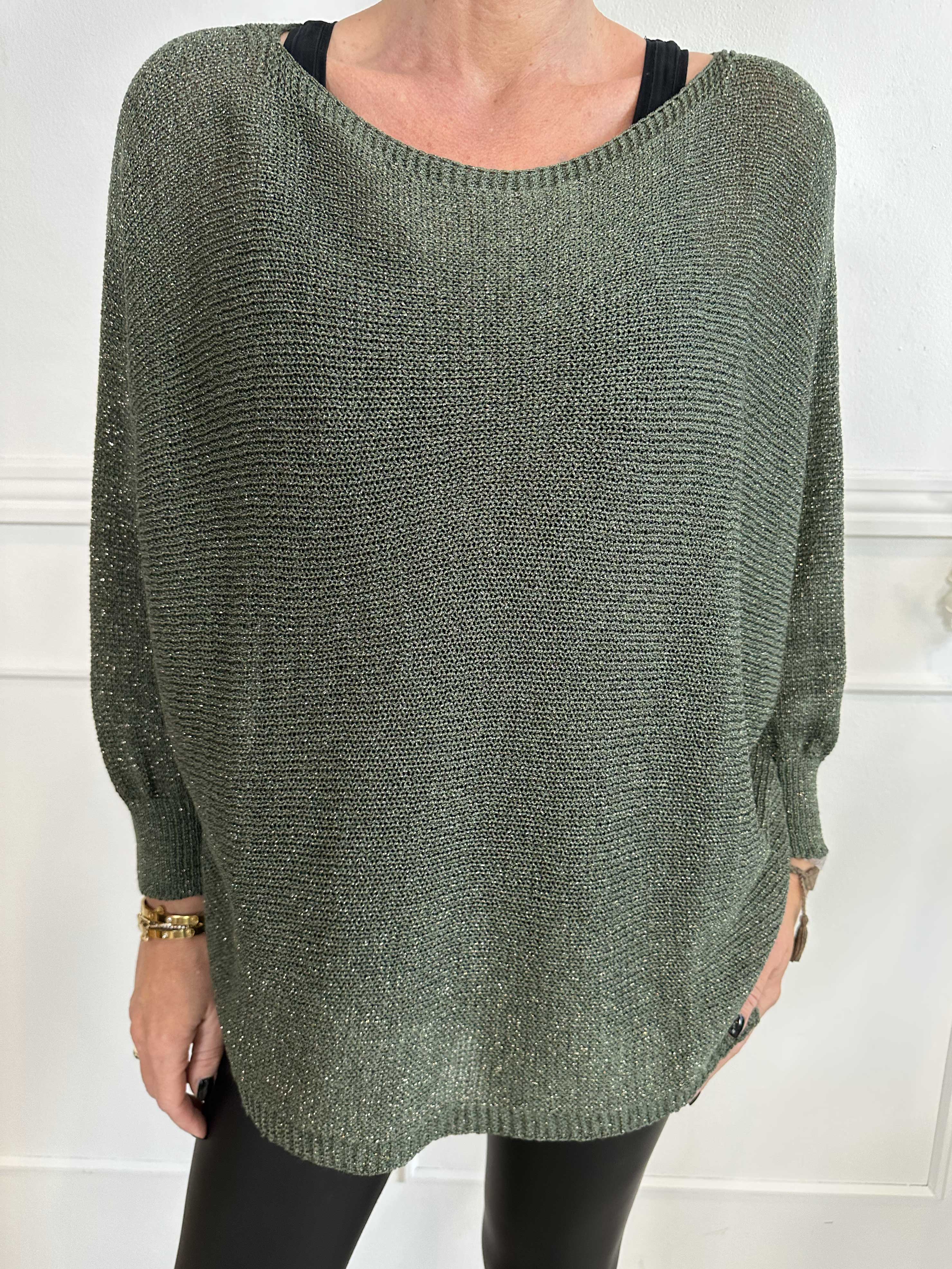 Paulina - Stickad blus med glittertrådar och rosett